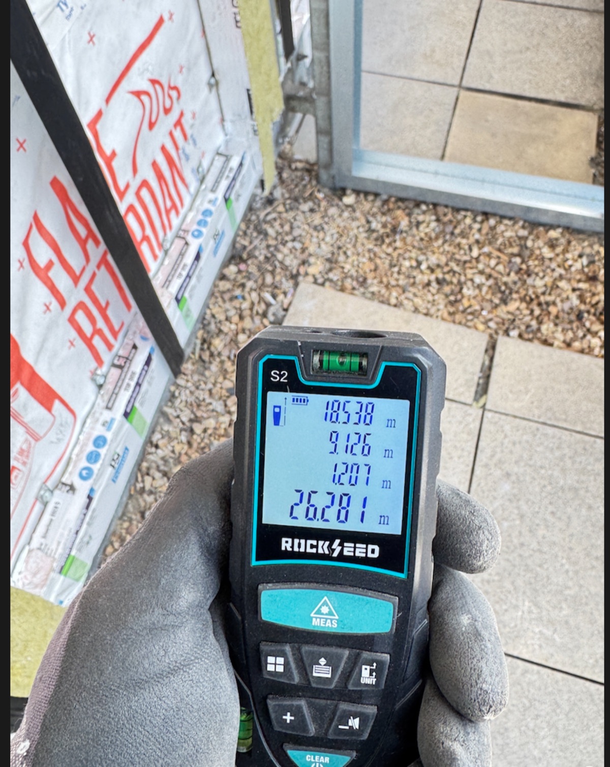 Facade setting out measurement recorded before installation