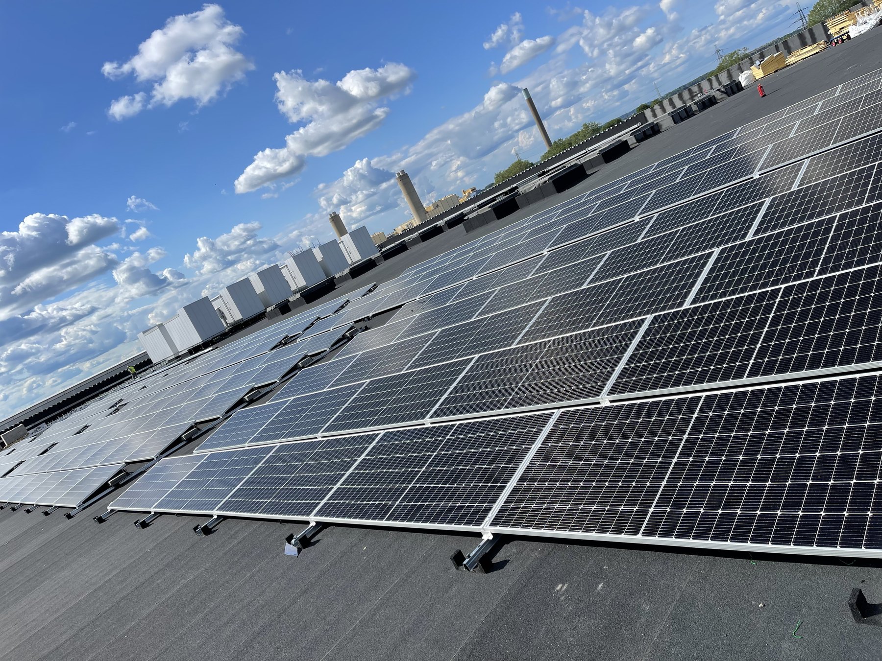 Finished data centre roof systems with solar arrays and roof interfaces