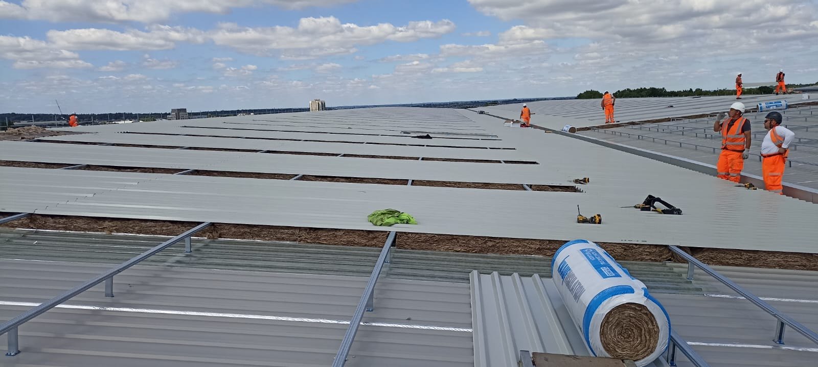 Roof build-up and insulation works during data centre envelope installation