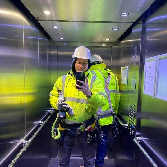 Evgheni Timeev, founder of Cladders.co.uk, on site in PPE.
