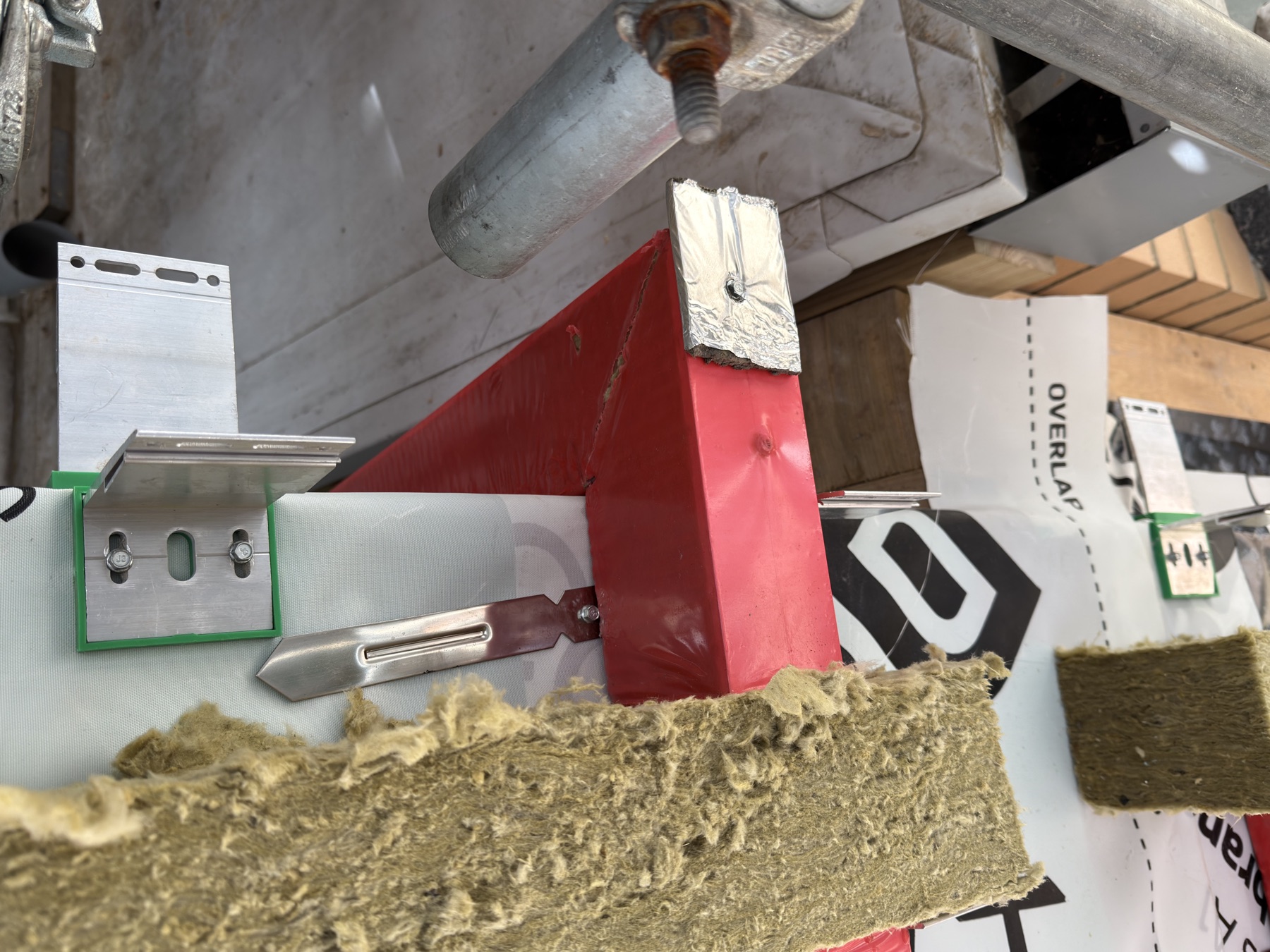 Fire barrier set-back check against the future panel line during facade works
