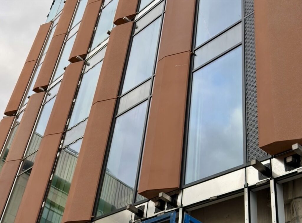 GRC Feature Panel Installation on Curtain Wall Facade