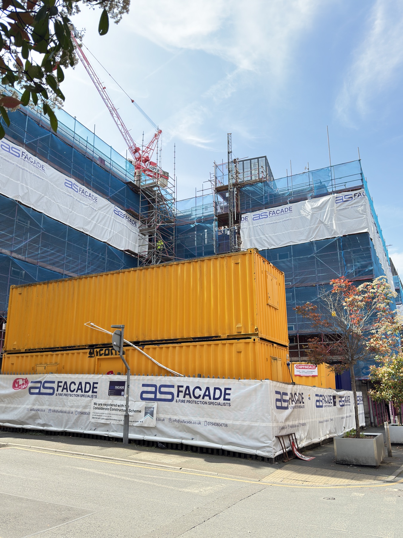 Occupied recladding environment with scaffold access