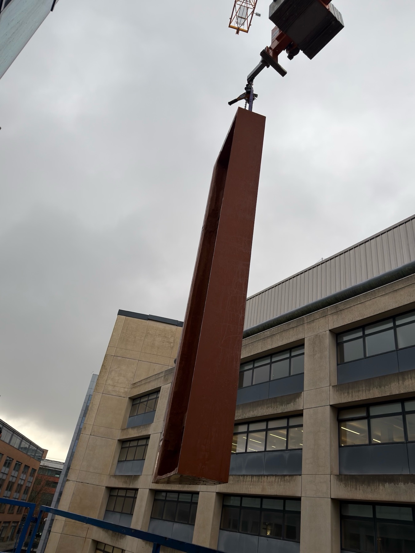 GRC facade panel lifted by crane at One Friary, Bristol.